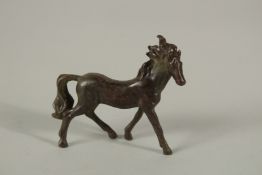 A BRONZE FOAL 8cms long.