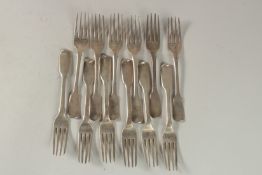 A SET OF TWELVE VICTORIAN FIDDLE PATTERN DESSERT FORKS London 1839, maker: C. B., weight: 17ozs.