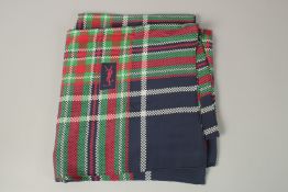 A LARGE YVES SAINT LAURENT RED AND BLUE POLKA DOT SILK SCARF. 122cms x 130cms.