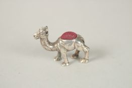 A SILVER CAMEL PIN CUSHION. 3.5cms.