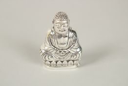 A SILVER PLATED BUDDHA. 6cms.