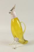A LARGE AMBER GLASS AND SILVER PLATE BIRD CLARET JUG. 33cms high.