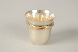 A CARTIER, PARIS, .925 SILVER WHISKY TOT. 27grms. No. 303766, in a red Cartier box.