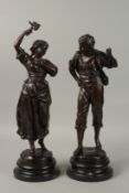 A PAIR OF SPELTER BRONZED CLASSICAL FIGURES on wooden bases. 