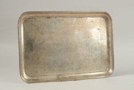 A VICTORIAN SILVER RECTANGULAR TRAY with crest. 38cm x 26cm wide.