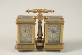 A DOUBLE SEVRES MINI CARRIAGE CLOCK with carrying handle. 10cms high.