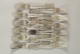 A SET OF TWELVE VICTORIAN FIDDLE PATTERN DESSERT FORKS. London 1854, maker: S. H. over D.C., weight: