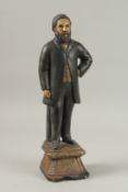 JOHN HEWITT 1867, A FOLK ART STANDING FIGURE. 38cms high.