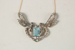 A GOOD SILVER DIAMOND AND AQUAMARINE DRAGONFLY NECKLACE.