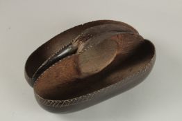 A LARGE OLD COCO DE MER BASKET. 33cms long x 21cms wide.