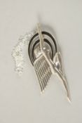 A SILVER ART DECO ENAMEL FLYING LADY PENDANT AND CHAIN.