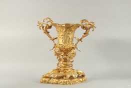 A GOOD ORMOLU TWO HANDLED URN with acanthus and scroll mounts.