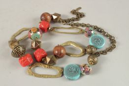 A NECKLACE set with various stones.