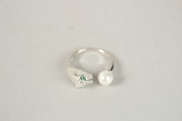 A SILVER PANTHER PEARL RING. Ring size (M).
