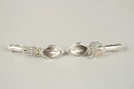 A PAIR OF SILVER OWL POSY HOLDER BROOCHES.