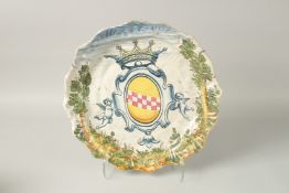 A LARGE 18TH CENTURY SAVONA MAJOLICA CHARGER painted in brilliant colours with crest. 43cms