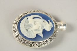 A WHITE METAL CARVED OVAL SCENT BOTTLE. 8cms.