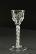 A GOOD GEORGIAN ENGRAVED CORDIAL GLASS with air twist stem.