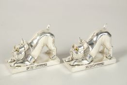 A PAIR OF ART DECO PUG DOG SALT AND PEPPERS. 8cms high.
