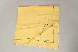 A VALENTINO YELLOW SILK SCARF. 63cms x 63cms.