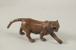 A JAPANESE BRONZE TIGER. 14.5cms long.