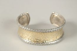 A SILVER GILDED BRACELET.