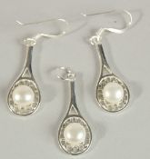 A PAIR OF SILVER AND MOTHER-OF-PEARL TENNIS EARRINGS AND PENDANT.