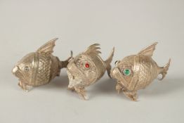 THREE SMALL CHINESE SILVER FISH. 64grms. 6cms long.