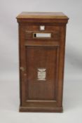 A VERY GOOD LARGE OAK COUNTRY HOUSE POST BOX, with brass plaques and letter slot, panelled door
