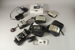A COLLECTION OF EIGHT VARIOUS CAMERAS: CANNON, OLYMPUS, ZEISS, SONY etc.