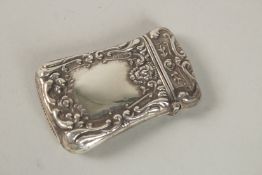 A SILVER EMBOSSED VESTA CASE. 5.5cms.