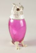 A LARGE BLUE GLASS AND SILVER PLATE NOVELTY OWL CLARET JUG. 28cms high.
