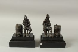 A RARE PAIR OF 18TH DUTCH BRONZE FIGURAL SMOKING COMPANIONS, in the manner of Pierre Xavery. Each