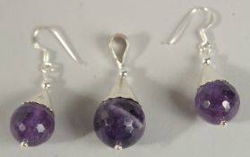 A PAIR OF SILVER AND AMETHYST EARRINGS AND PENDANT.