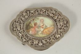A FRENCH SILVER SHAPED COMPACT, the top inset with a miniature. 10cms long x 7cms wide. 110grms.