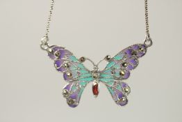 A SILVER PLIQUE ENAMEL , MARCASITE AND GARNET BUTTERFLY NECKLACE.