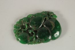 A LARGE PIERCED JADE PENDANT. 9cms x 6cms.