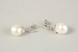 A PAIR OF BAROQUE PEARL DROP EARRINGS.