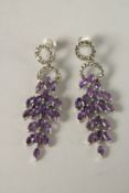 A PAIR OF AMETHYST AND MARCASITE WATERFALL EARRINGS.