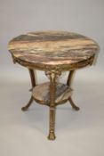 A GOOD VEINED MARBLE AND ORMOLU TWO TIER TABLE with ram's heads, curving legs ending in hoof feet.