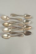 A SET OF EIGHT GEORGE IV FIDDLE AND SHELL PATTERN DESSERT SPOONS. Edinburgh 1825, maker: J & W.