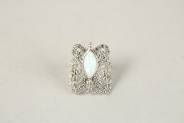 A SILVER MARCASITE AND OVAL OPAL BUTTERFLY RING. Ring size (P).
