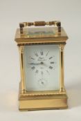 A GOOD FRENCH GILT CARRIAGE CLOCK with repeat action and alarm, RAPPORT FONDEE en 1900 France. 15cms