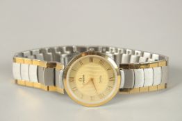 AN OMEGA STAINLESS STEEL AND GOLD DE VILLE WRISTWATCH.