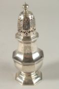 A GOOD GEORGE I OCTAGONAL SILVER SUGAR CASTER, 17cms high. London 1714. Maker: Christopher Canner.