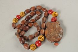 A CHINESE NECKLACE WITH BUDDHA PENDANT.
