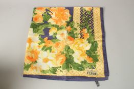A GIANFRANCO FERRE TRELLIS AND FLOWERS SILK SCARF. 90cms x 85cms.