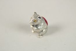A SILVER GUINEA PIG PIN CUSHION. 3cms.