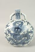 A CHINESE BLUE AND WHITE DRAGON MOONFLASK. 28cms high.