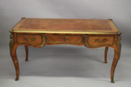 A GOOD 19TH CENTURY FRENCH KINGWOOD BUREAU PLAT with inset leather top, ormolu mounts, three drawers